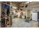 Organized garage features ample storage solutions, workbench, and ramp for accessibility at 1393 Turfway Dr, Avon, IN 46123