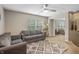 Comfortable living room with gray sofas, neutral walls, and natural light creates a welcoming space at 1393 Turfway Dr, Avon, IN 46123