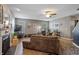 Spacious living room features a fireplace, hardwood floors, and cozy seating area with natural lighting at 1393 Turfway Dr, Avon, IN 46123
