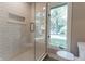 Updated bathroom with glass door shower featuring white subway tile and mosaic tile floor at 14407 Bryn Mawr Dr, Fishers, IN 46038