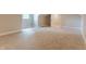 Spacious bedroom has neutral walls, plush carpeting, white trim and lots of natural light at 14407 Bryn Mawr Dr, Fishers, IN 46038