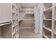 Walk-in closet with built in shelving at 14407 Bryn Mawr Dr, Fishers, IN 46038