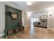 Stylish foyer with custom storage bench, decorative accents, and open access to living areas at 14407 Bryn Mawr Dr, Fishers, IN 46038