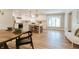 Bright kitchen with white cabinets, stainless steel appliances, and a spacious center island with seating at 14407 Bryn Mawr Dr, Fishers, IN 46038