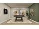 Game room featuring a modern pool table, stylish artwork and neutral decor for sophisticated entertaining and relaxation at 15389 Manderley St, Fishers, IN 46040