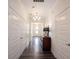Long hallway with fresh paint, modern lighting, and access to multiple rooms at 1580 Mairn Ave, Carmel, IN 46032