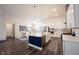 Modern kitchen boasts stainless steel appliances, a large center island, and stylish pendant lighting at 1580 Mairn Ave, Carmel, IN 46032