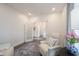 Bright sitting room with modern decor, comfortable seating, and stylish accents at 1580 Mairn Ave, Carmel, IN 46032