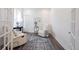 Cozy sitting room with comfortable chairs, hardwood floors, and natural light at 1580 Mairn Ave, Carmel, IN 46032