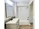Beautiful bathroom featuring subway tile shower and modern vanity at 15841 E 265 N, Columbus, IN 47203