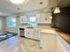 Bright kitchen with updated cabinets, granite countertops, and stainless steel appliances at 15841 E 265 N, Columbus, IN 47203