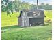 Exterior view of storage shed on beautiful lawn at 15841 E 265 N, Columbus, IN 47203