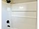 New shower featuring white tiled walls, black fixtures and a built-in niche at 15841 E 265 N, Columbus, IN 47203