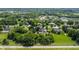 Aerial view of a residential area with homes, trees, and community features at 15920 Oak Park Ct, Westfield, IN 46074