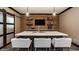 Basement bar with bar seating, a brick wall, and overhead lighting at 15920 Oak Park Ct, Westfield, IN 46074