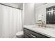 Bathroom featuring a modern vanity with sleek hardware and a combined shower and bathtub for convenience at 15920 Oak Park Ct, Westfield, IN 46074