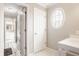 Bathroom featuring a view to the left, a door straight ahead, and an oval window on the right at 15920 Oak Park Ct, Westfield, IN 46074