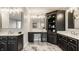 Elegant bathroom with a built-in vanity and storage and and sinks at 15920 Oak Park Ct, Westfield, IN 46074