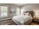 Bedroom with a bed and two windows showing lots of natural light at 15920 Oak Park Ct, Westfield, IN 46074