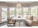 Charming breakfast nook with bright windows, table with seating, and lots of natural light at 15920 Oak Park Ct, Westfield, IN 46074