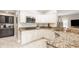 Bright kitchen featuring white cabinets, granite countertops, stainless steel appliances and tile flooring at 15920 Oak Park Ct, Westfield, IN 46074