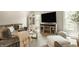Comfortable living room with plush seating, neutral decor, and a view of the outdoors at 15920 Oak Park Ct, Westfield, IN 46074
