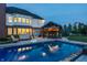 Backyard pool with bar area, perfect for entertaining guests outdoors at 15920 Oak Park Ct, Westfield, IN 46074