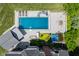 Aerial view of a backyard featuring a pool, slide, hot tub, and outdoor bar at 15920 Oak Park Ct, Westfield, IN 46074