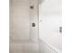 The shower features stone tiles, a built-in bench, and a glass door at 15920 Oak Park Ct, Westfield, IN 46074