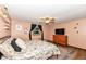 Inviting bedroom featuring stylish rug, ceiling fan, modern decor, and natural light at 1624 Riley Rd, Lebanon, IN 46052