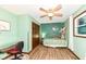 Cozy bedroom with a ceiling fan, ample closet space, and natural light from a window at 1624 Riley Rd, Lebanon, IN 46052