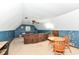 Cozy living room with a seating area, ceiling fan, and decorative elements for a relaxing ambiance at 1624 Riley Rd, Lebanon, IN 46052
