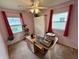 Bright room perfect for a home office, with natural light and pink walls at 1816 Hemlock Ln, Plainfield, IN 46168