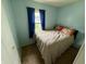 Small bedroom with a window, closet, and comfortable bed at 1816 Hemlock Ln, Plainfield, IN 46168