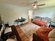 Cozy living room features wood floors, neutral paint, piano, and comfortable seating at 1816 Hemlock Ln, Plainfield, IN 46168