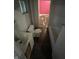 Bathroom with toilet, sink, and a tub/shower combo needing repairs at 1902 Orange St, Indianapolis, IN 46203