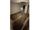 Bedroom with hardwood flooring and bare walls that needs TLC at 1902 Orange St, Indianapolis, IN 46203