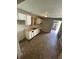 An eat-in kitchen featuring tile floors and basic white cabinets at 1902 Orange St, Indianapolis, IN 46203