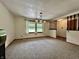 Open dining room with decorative lighting and access to the living area at 1980 S Arthur Rd, Paragon, IN 46166