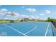 Community full basketball court with benches and lush landscape views, it's great for active residents at 235 Highland Ave, Danville, IN 46122