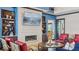 Relax in the clubhouse with a fireplace, entertainment center, and comfortable seating areas for relaxation at 235 Highland Ave, Danville, IN 46122