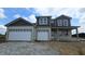 New two-story home featuring attached two-car garage and craftsman style architecture at 235 Highland Ave, Danville, IN 46122