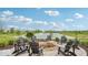 Inviting community fire pit overlooking a picturesque pond at 235 Highland Ave, Danville, IN 46122