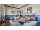 Bright and inviting game room features tables, chairs, and decor for relaxing and socializing at 235 Highland Ave, Danville, IN 46122