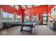 Community game room with a pool table and plenty of seating at 235 Highland Ave, Danville, IN 46122