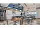 Stylish kitchen features stainless steel appliances, counter seating, and wood-look flooring at 235 Highland Ave, Danville, IN 46122