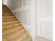 Wooden staircase leading to the upper level of the home at 235 Highland Ave, Danville, IN 46122