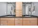Bathroom features double sinks, a vanity with lots of storage and a granite countertop at 25 E 40Th St # Apt 1B/D, Indianapolis, IN 46205