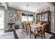 Elegant dining room features a chandelier, hardwood floors, and large windows for natural light at 25 E 40Th St # Apt 1B/D, Indianapolis, IN 46205