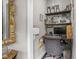 Cozy home office with custom shelving, a desk, and an ergonomic chair at 25 E 40Th St # Apt 1B/D, Indianapolis, IN 46205